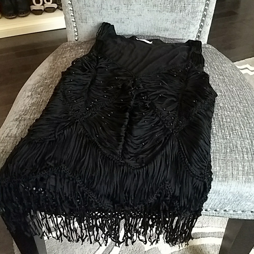 Cache shirt with netting and tassles